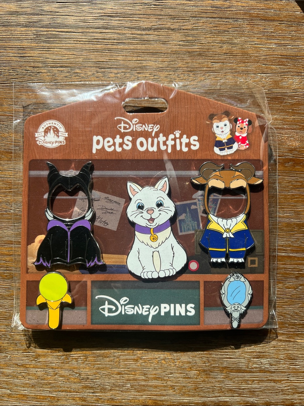 Disney Pets Outfits Pin Set — White cat with beast and maleficent costumes.